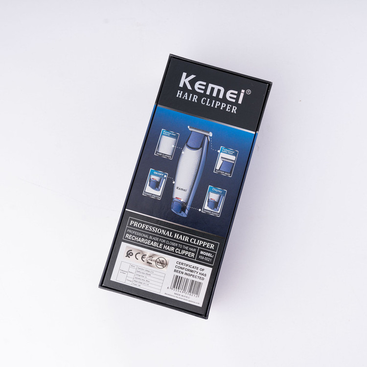 ماشین اصلاح موی سر و صورت کیمی مدل NEW km-5021 با تیغه استیل ضد زنگ، باتری 600 میلیآمپر، شارژ 60 دقیقه، زمان استفاده 90 دقیقه، توان 5 وات، اصلاح صفر زن و خط زن، همراه با 3 شانه سایز 1، 2 و 3 میلیمتر