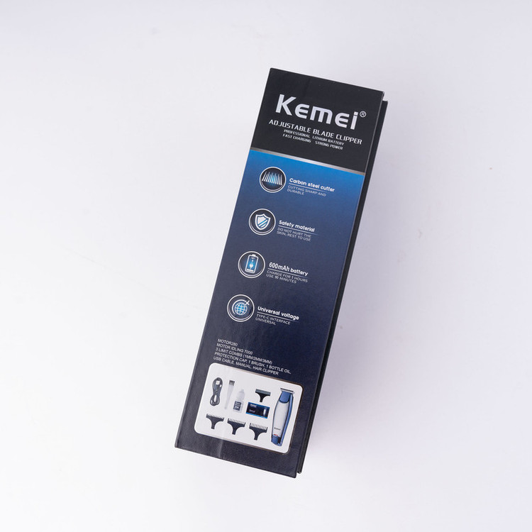 ماشین اصلاح موی سر و صورت کیمی مدل NEW km-5021 با تیغه استیل ضد زنگ، باتری 600 میلیآمپر، شارژ 60 دقیقه، زمان استفاده 90 دقیقه، توان 5 وات، اصلاح صفر زن و خط زن، همراه با 3 شانه سایز 1، 2 و 3 میلیمتر