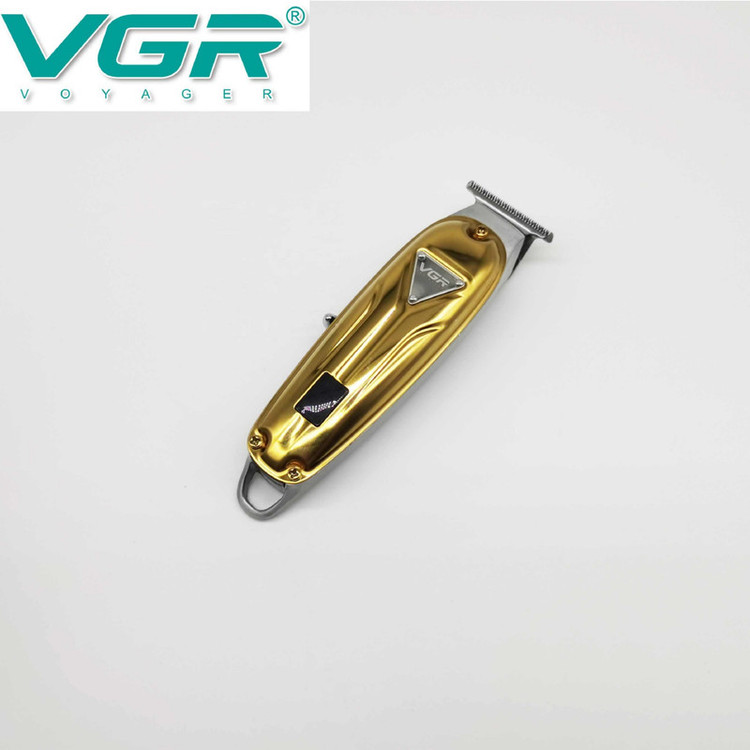 ماشین اصلاح مو صورت و سر وی جی آر مدل V-062 با باتری 1400mAh، شارژ سریع، 2 ساعت استفاده بیسیم، شانه متحرک در 4 اندازه، نمایشگر دیجیتال و قابلیت استفاده خشک و مرطوب