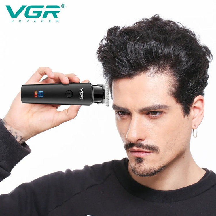 ماشین اصلاح موی سر و صورت وی جی ار مدل 937 با تیغه استیل ضد زنگ، اصلاح صفر زن، خط زن و حجم زن، امکان شارژ سریع، نمایشگر دیجیتال، شانههای 1.5، 3 و 4.5 میلیمتری، منبع انرژی کابل USB و مدت استفاده 500 دقیقه