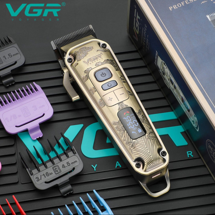 ماشین اصلاح موی سر و صورت وی جی آر (اصل) VGR مدل V-005 با تیغه کربن استیل و متالوژیک پودری، باتری لیتیومی 2600 میلیآمپر، نمایشگر LED، قابلیت تنظیم سرعت و 8 شانه اندازهگیری از 1.5 تا 19 میلیمتر، مدت استفاده 250 دقیقه پس از شارژ کامل